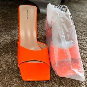 New in box never worn PLT orange patent leather mules